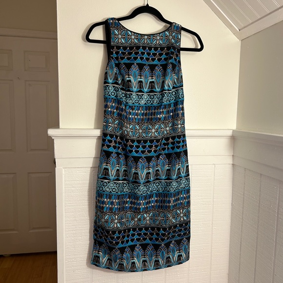 White House Black Market Dresses & Skirts - WHBM White House Black Market Black & Blue Metallic
Sheath Dress NWT, size 0